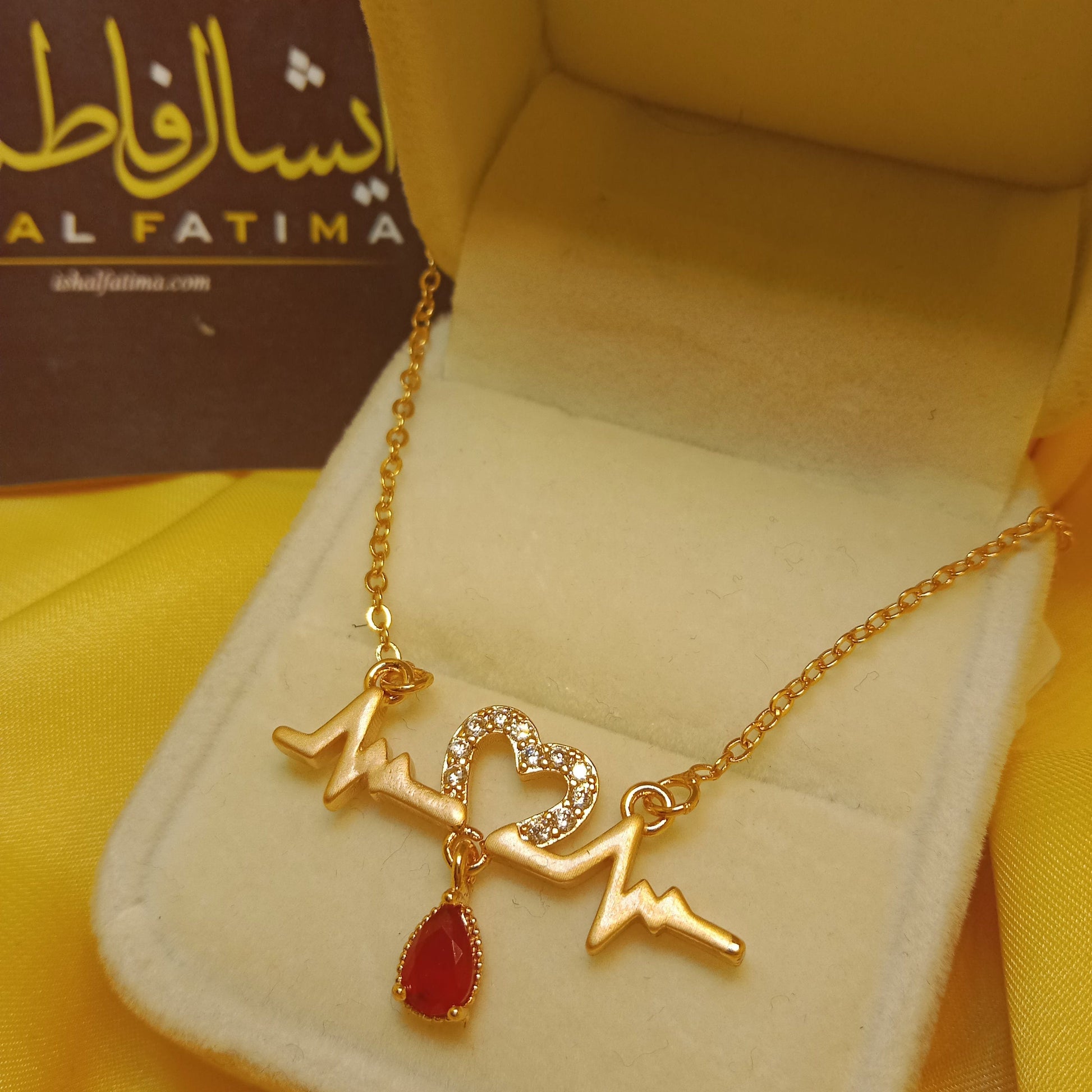 Ishal Fatima Golden Heart Beat Pendant