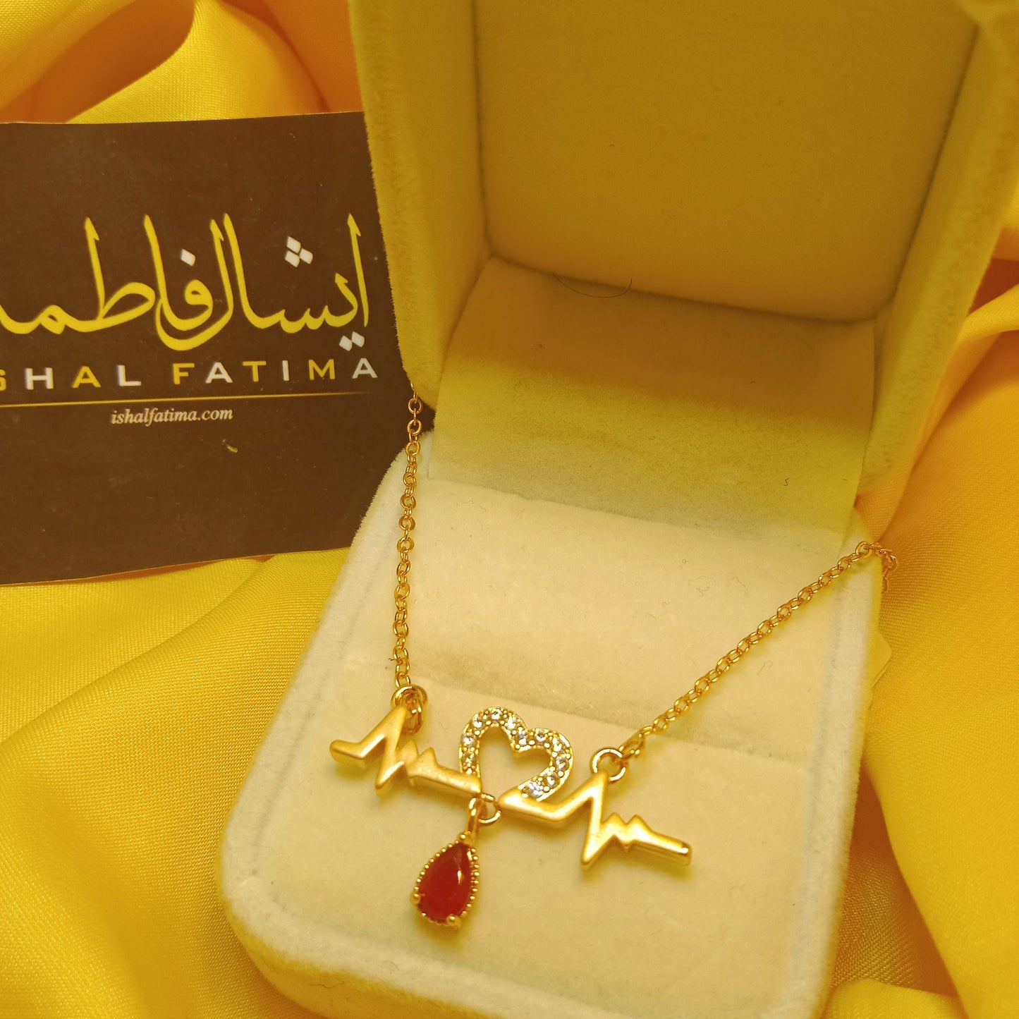 Ishal Fatima Golden Heart Beat Pendant